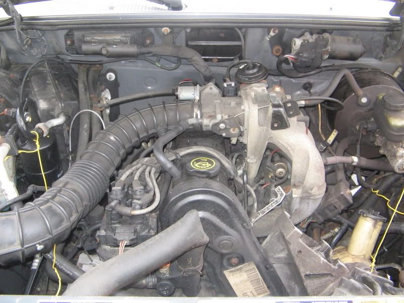 Here is a few pix of the old engine in the Mazda which I was told was N/G. 